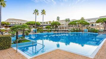 Indoor pool, 2 outdoor pools, open 11:00 AM to 7:00 PM, pool umbrellas