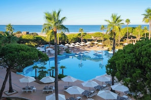 Indoor pool, 2 outdoor pools, open 11:00 AM to 7:00 PM, pool umbrellas
