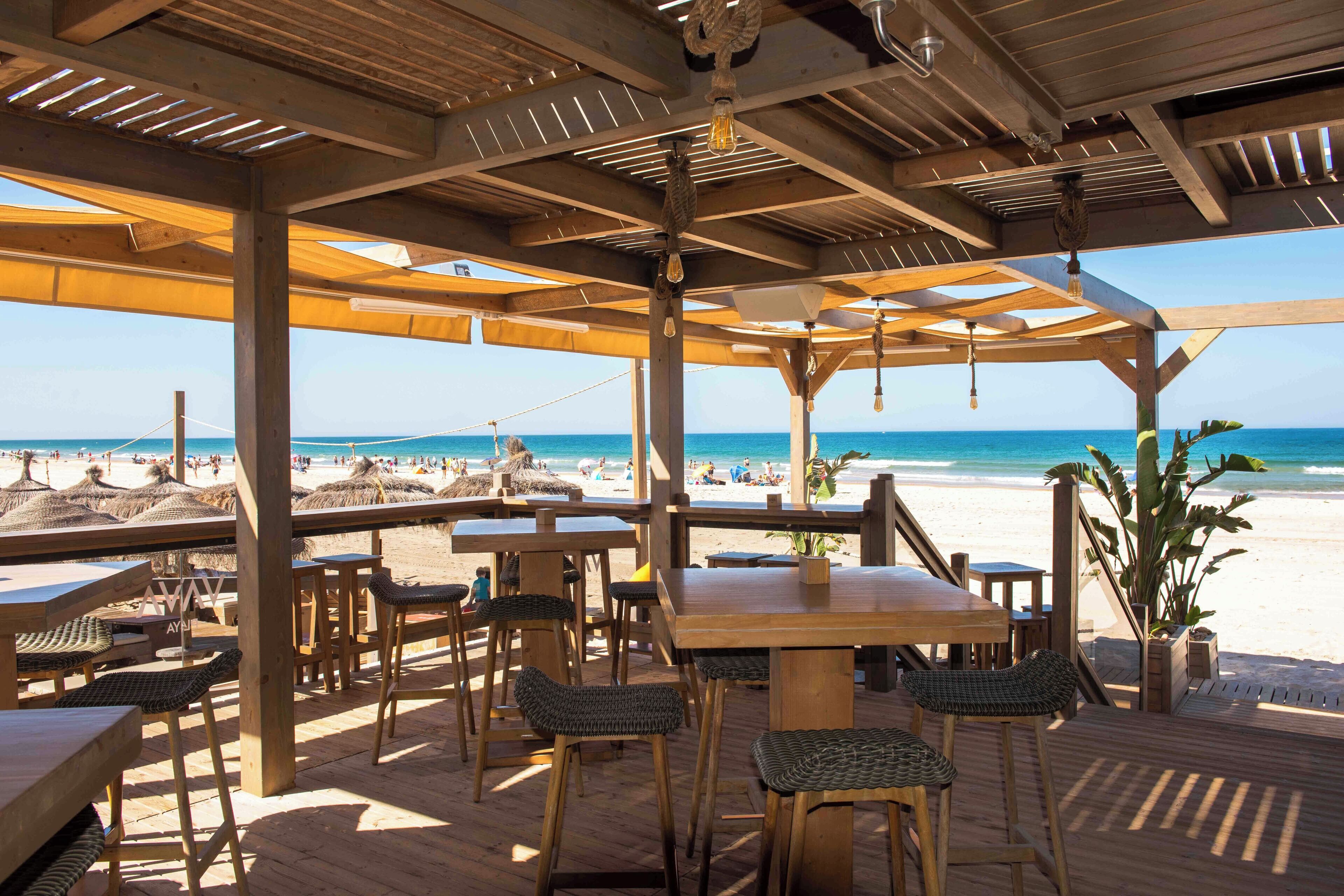 on the beach, white sand, sun-loungers, beach umbrellas