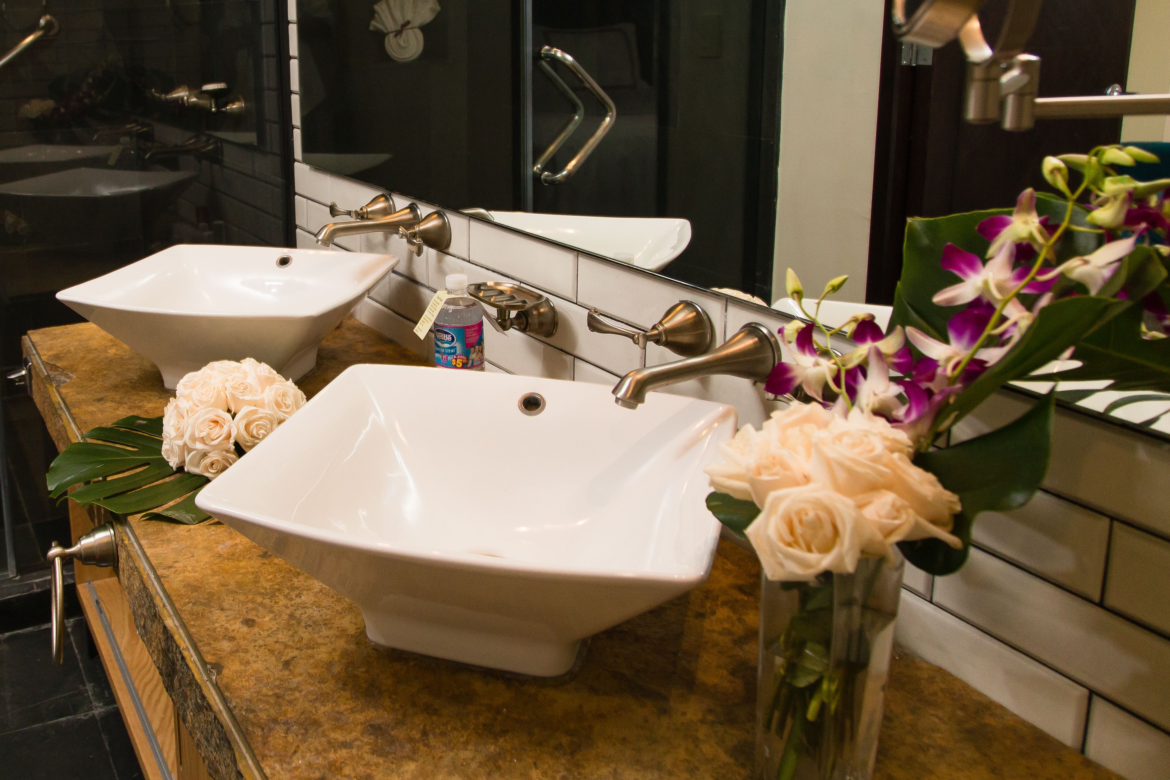 standard room, 2 queen beds, city view | bathroom sink