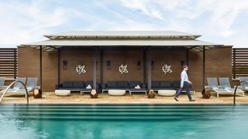 Outdoor pool, open 6:00 AM to 10:00 PM, pool cabanas (surcharge)