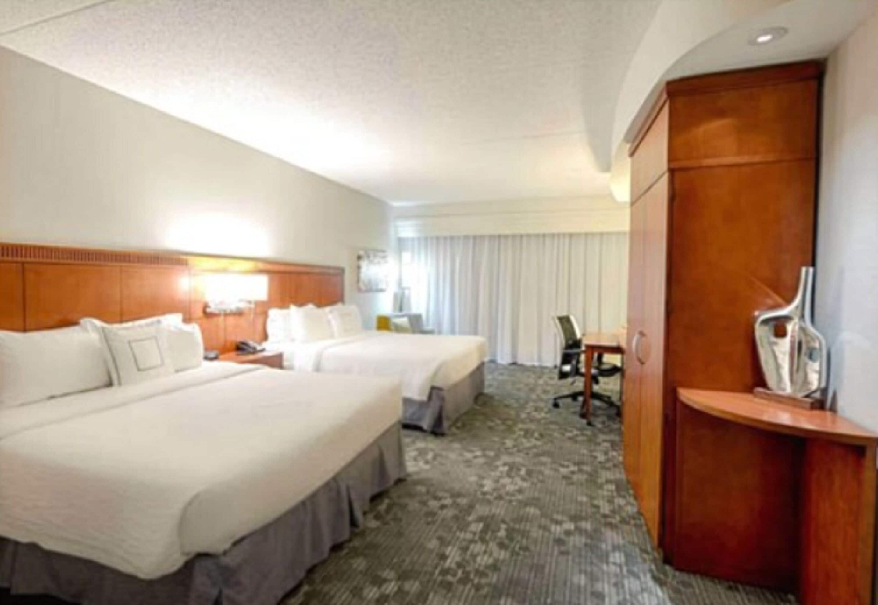 premium bedding, desk, laptop workspace, iron/ironing board