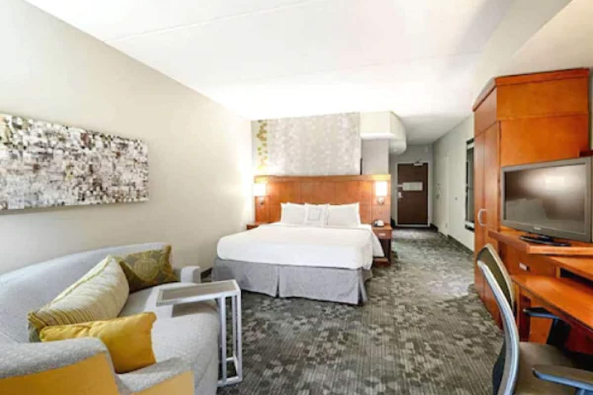 premium bedding, desk, laptop workspace, iron/ironing board