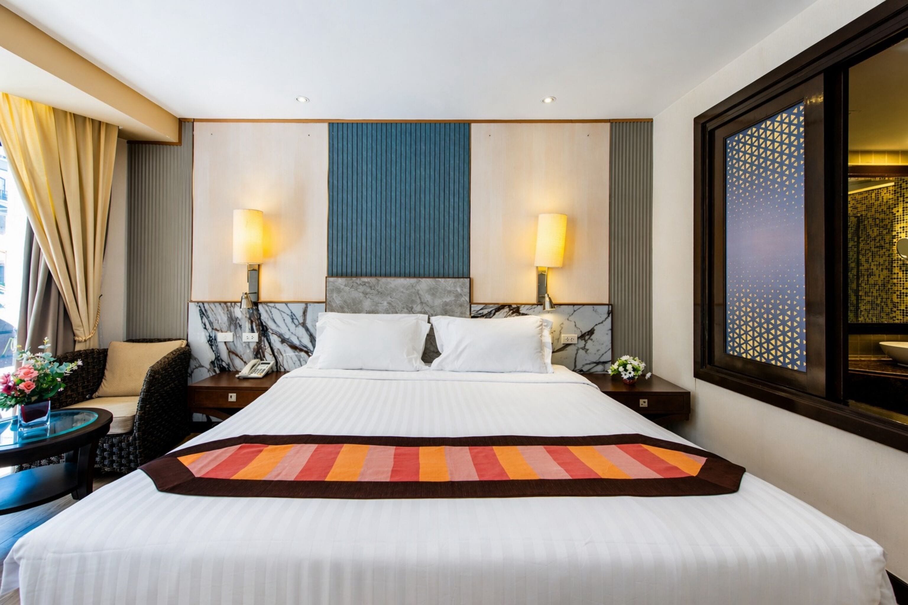 Deluxe Room, Pool Access | In-room safe, individually furnished, desk, free WiFi