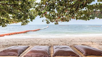 Aan het strand, parasols