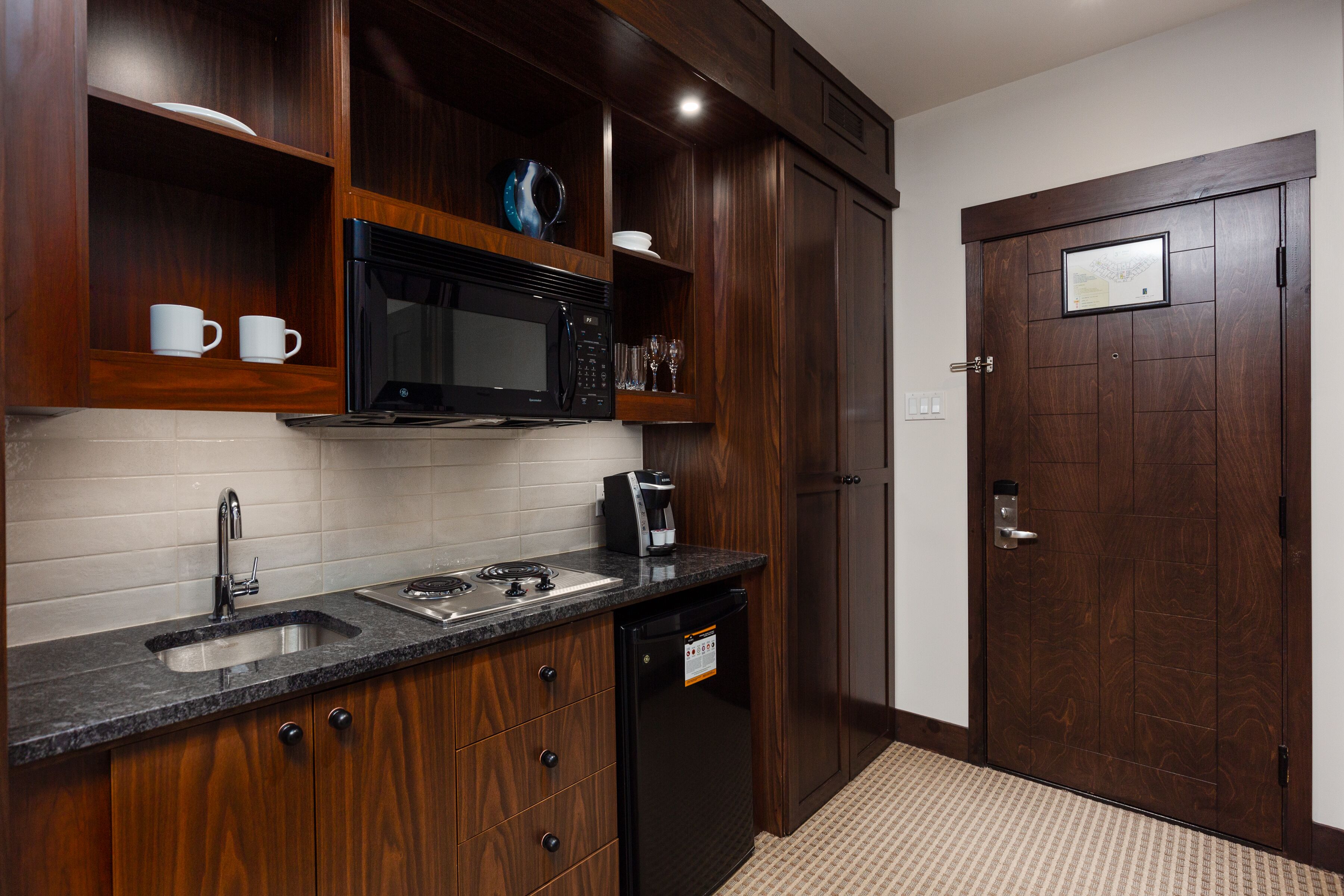 mini-fridge, microwave, coffee/tea maker, electric kettle