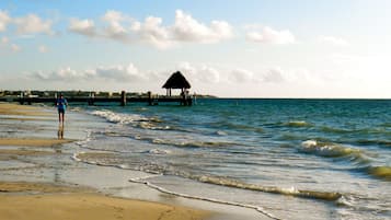 Private beach, white sand, beach cabanas, beach towels