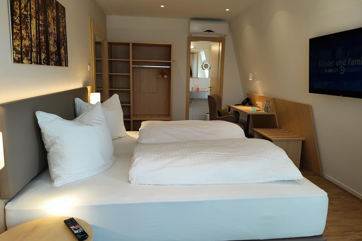 down duvets, desk, laptop workspace, blackout curtains