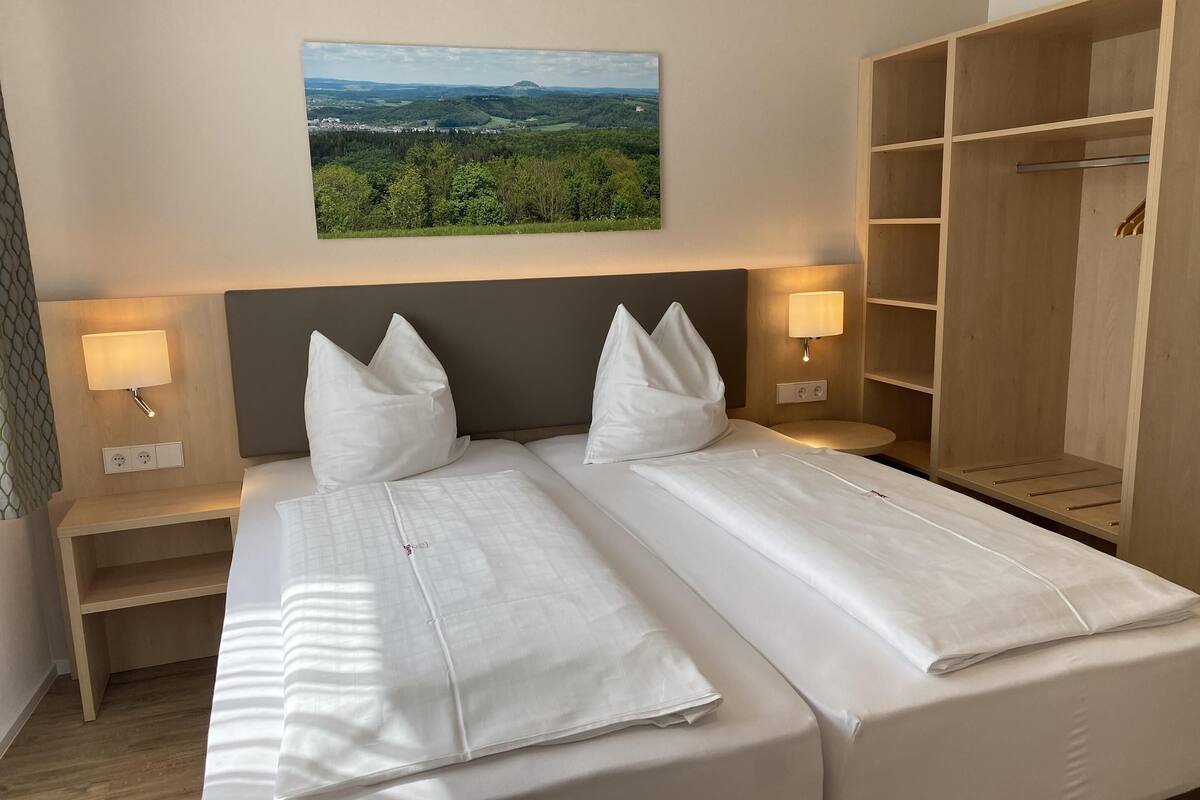 down duvets, desk, laptop workspace, blackout curtains