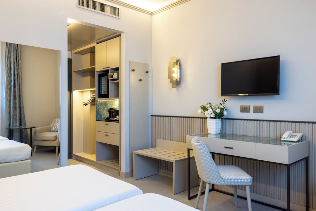 Exclusieve Twin kamer | Luxe beddengoed, donsdekens, een minibar, een kluis op de kamer