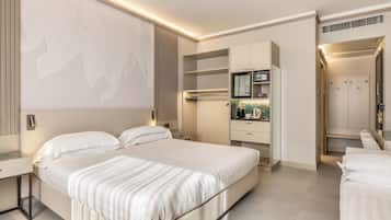 Habitación cuádruple exclusiva | Ropa de cama de alta calidad, edredón y minibar