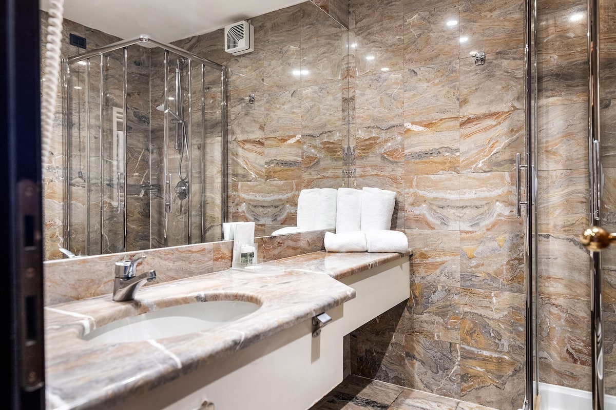 free toiletries, hair dryer, slippers, bidet