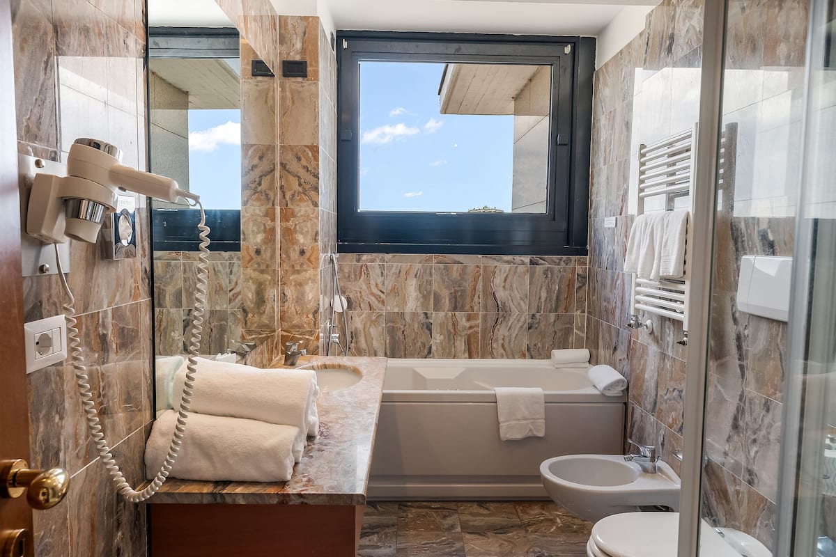 panoramic triple room | bathroom | free toiletries, hair dryer, slippers, bidet