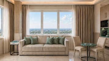Panoramic Triple Room | Living area | 32-inch flat-screen TV with satellite channels, TV