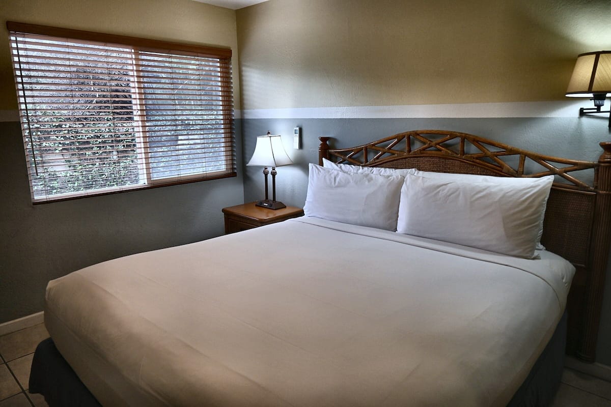 Suite, 1 King Bed, Pool View | Premium bedding, pillowtop beds, individually decorated