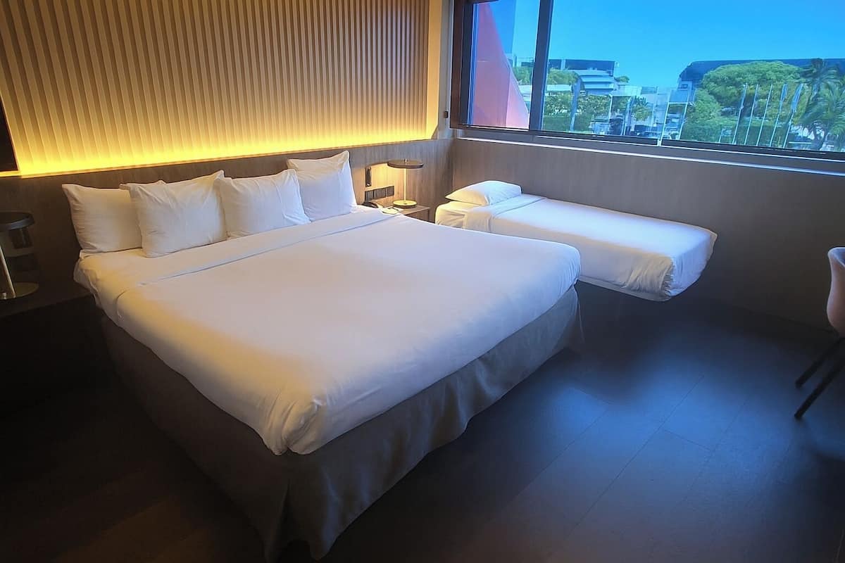 Deluxe Triple Room | Premium bedding, in-room safe, desk, blackout curtains