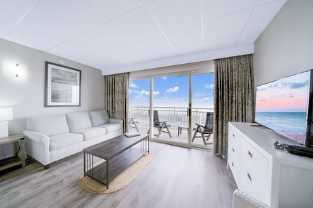 Deluxe Two Double Bed Suite with Kitchenette, Oceanfront | Living area | Flat-screen TV. Montreal Beach Resort