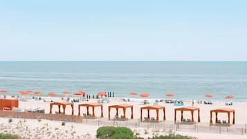 Beach nearby, beach cabanas, beach umbrellas, beach towels