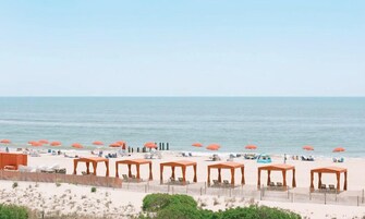 Beach nearby, beach cabanas, beach umbrellas, beach towels