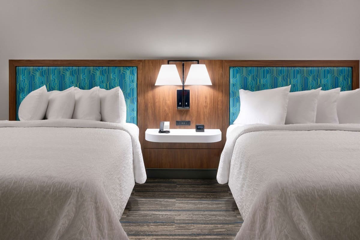 Premium bedding, in-room safe, blackout drapes, soundproofing