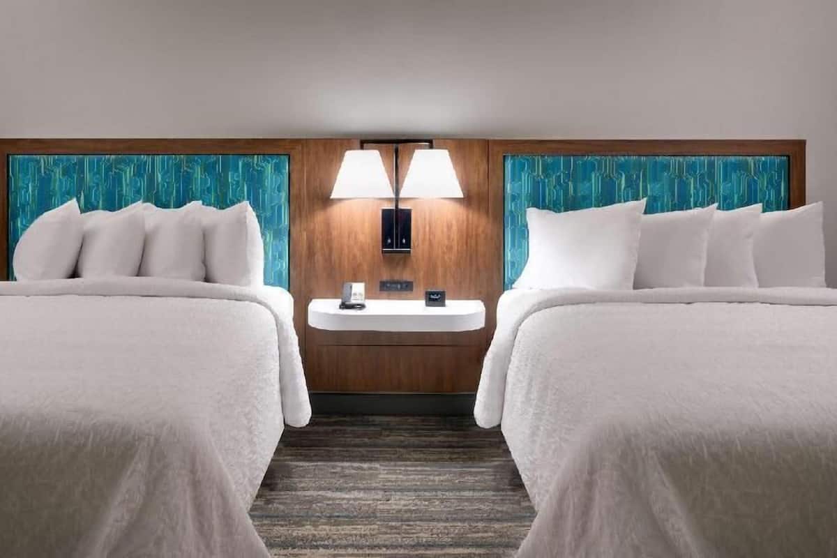 Premium bedding, in-room safe, blackout drapes, soundproofing