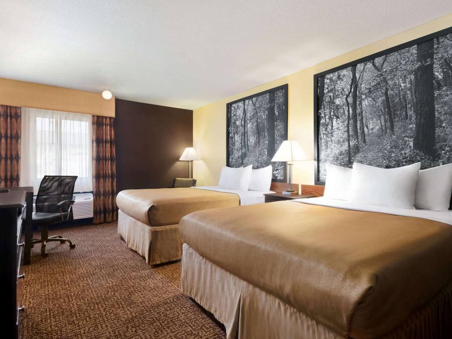 Premium bedding, desk, blackout drapes, soundproofing