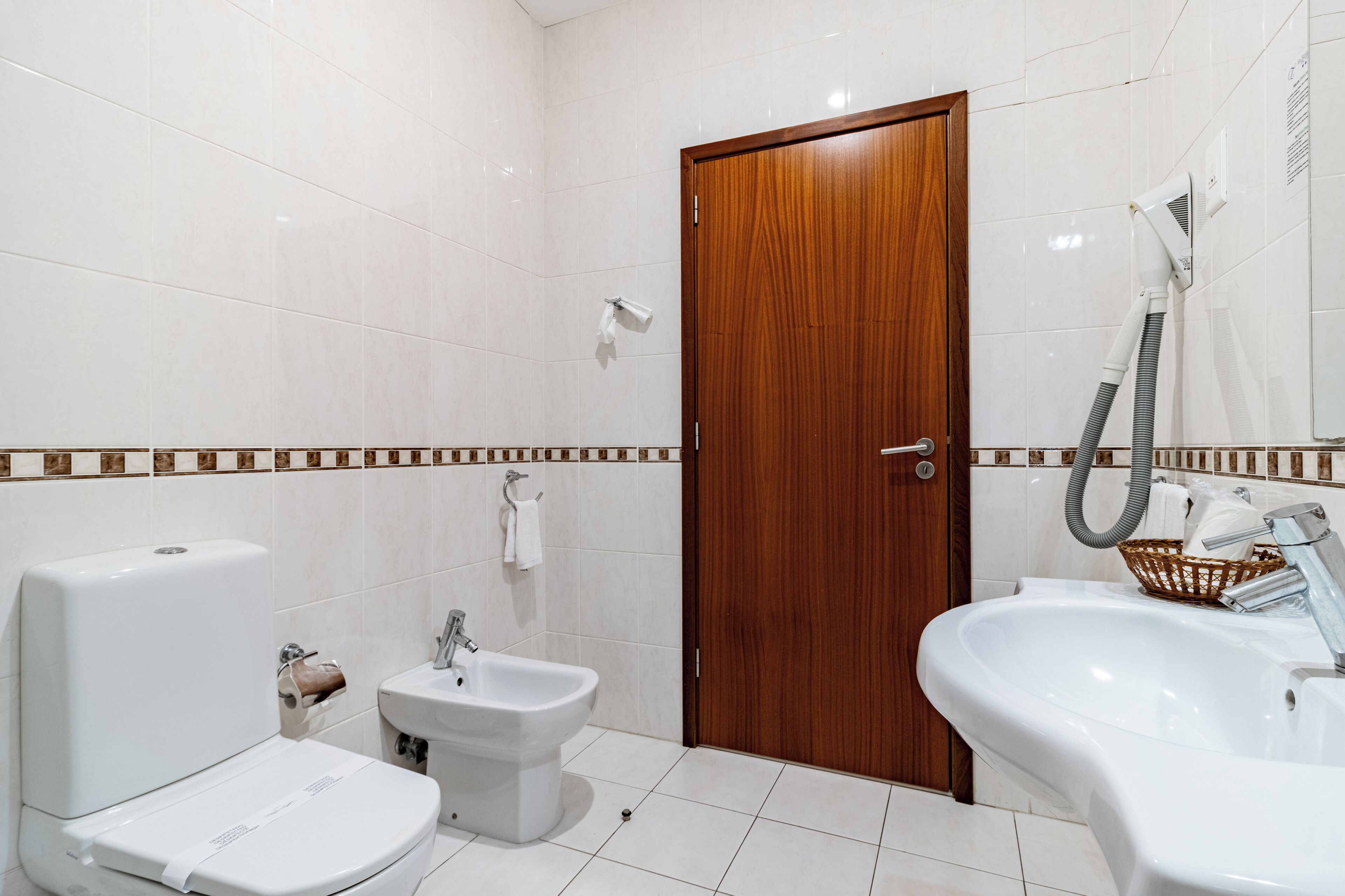 free toiletries, hair dryer, bidet, towels