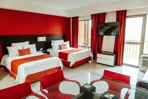 Suite, cocina básica | Zona de estar | Televisión LCD de 32 pulgadas con canales por cable, una televisión