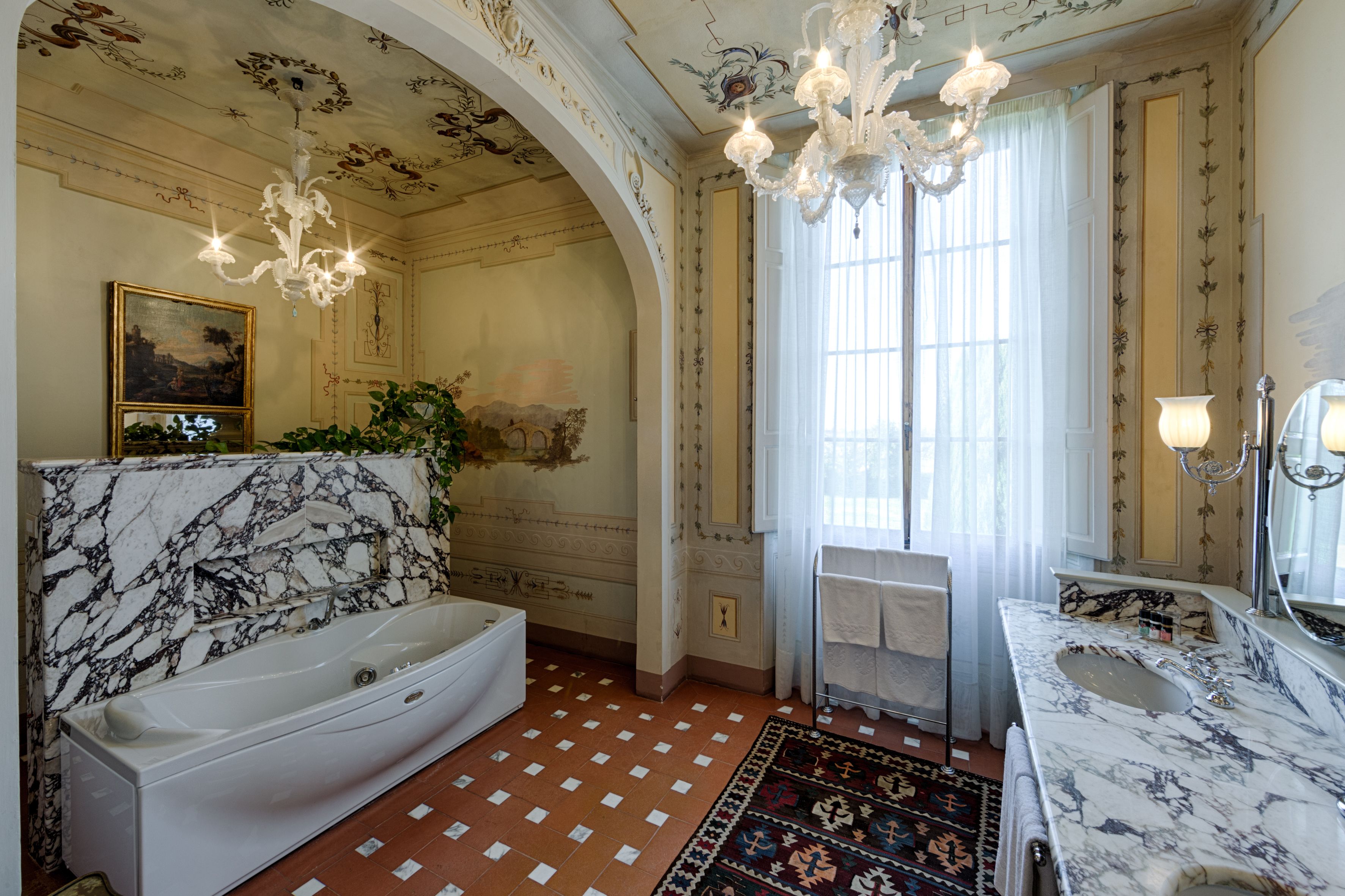 junior suite (villa) | bathroom | combined shower/bathtub, jetted bath, free toiletries, hair dryer