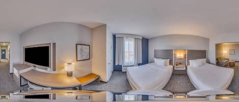 Premium bedding, pillow-top beds, desk, laptop workspace