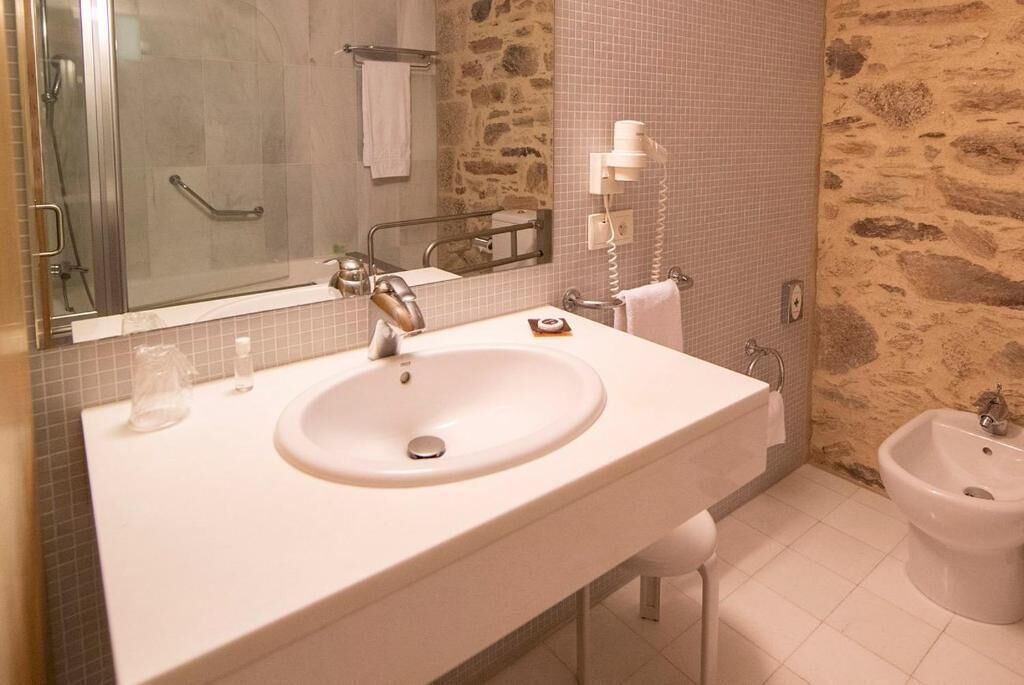 single room | bathroom | bathtub, hair dryer, bidet, towels