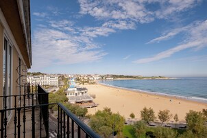 Deluxe Room, Balcony, Sea View | Down comforters, minibar, in-room safe, desk