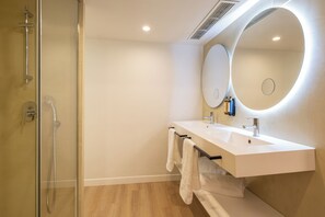 Junior Suite, Sea View | Down comforters, minibar, in-room safe, desk