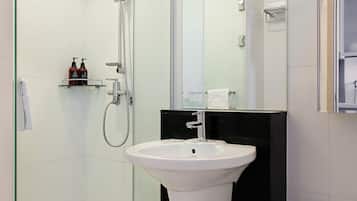Shower, hair dryer, slippers, towels
