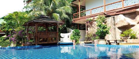 2 outdoor pools, pool umbrellas, pool loungers