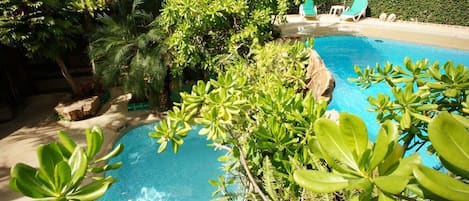 2 outdoor pools, pool umbrellas, pool loungers