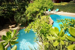 2 outdoor pools, pool umbrellas, pool loungers