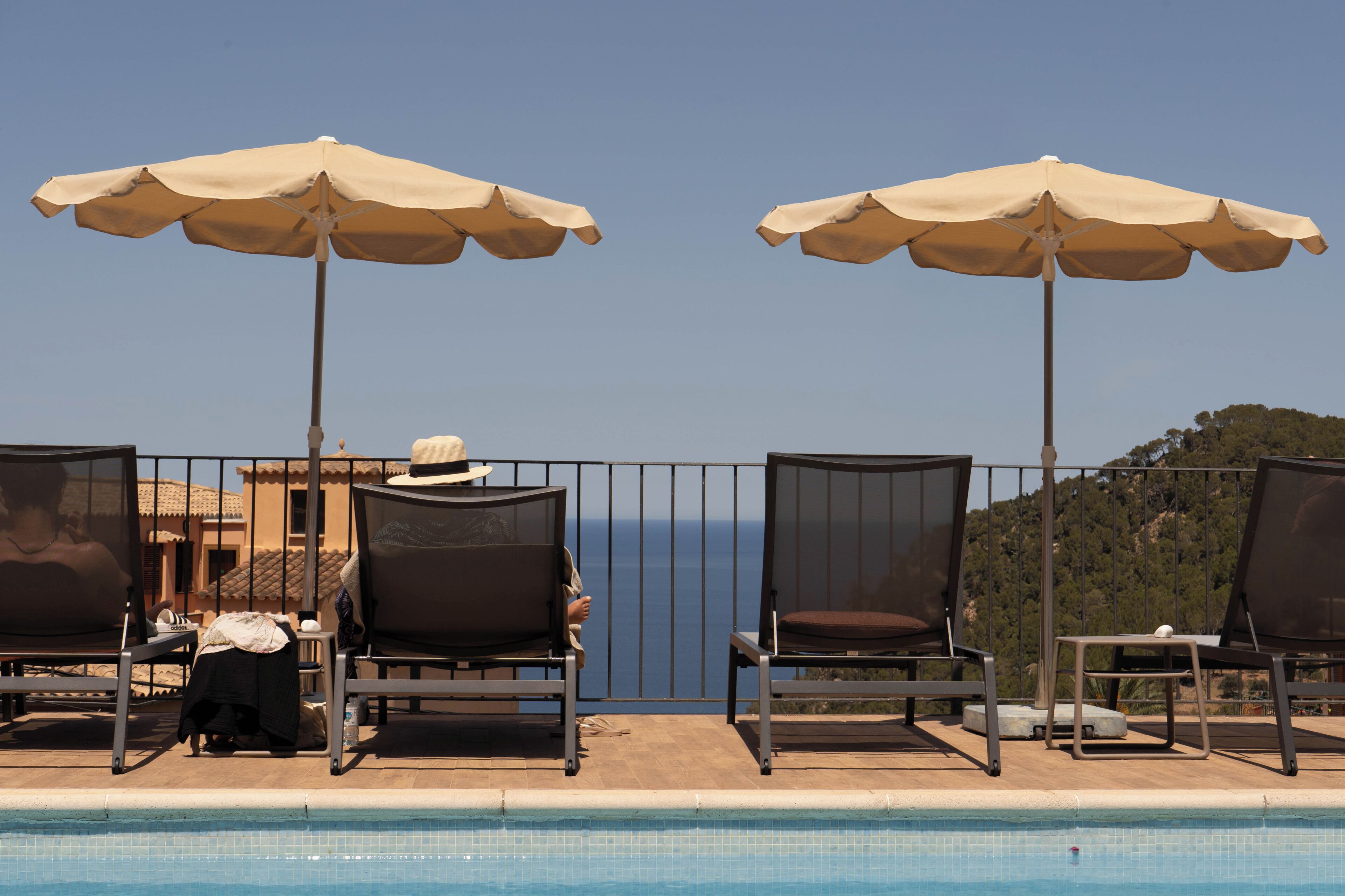 Indoor pool, outdoor pool, pool umbrellas, pool loungers