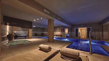 Indoor pool, outdoor pool, pool umbrellas, pool loungers