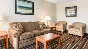 Desk, laptop workspace, blackout curtains, iron/ironing board