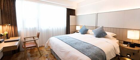 Chambre Ălite double | Literie de qualitĂ©, minibar, coffre-fort, bureau