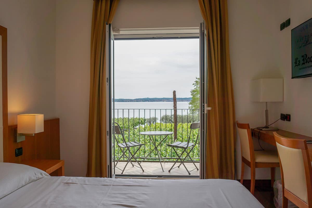 superior room | minibar, in-room safe, desk, laptop workspace