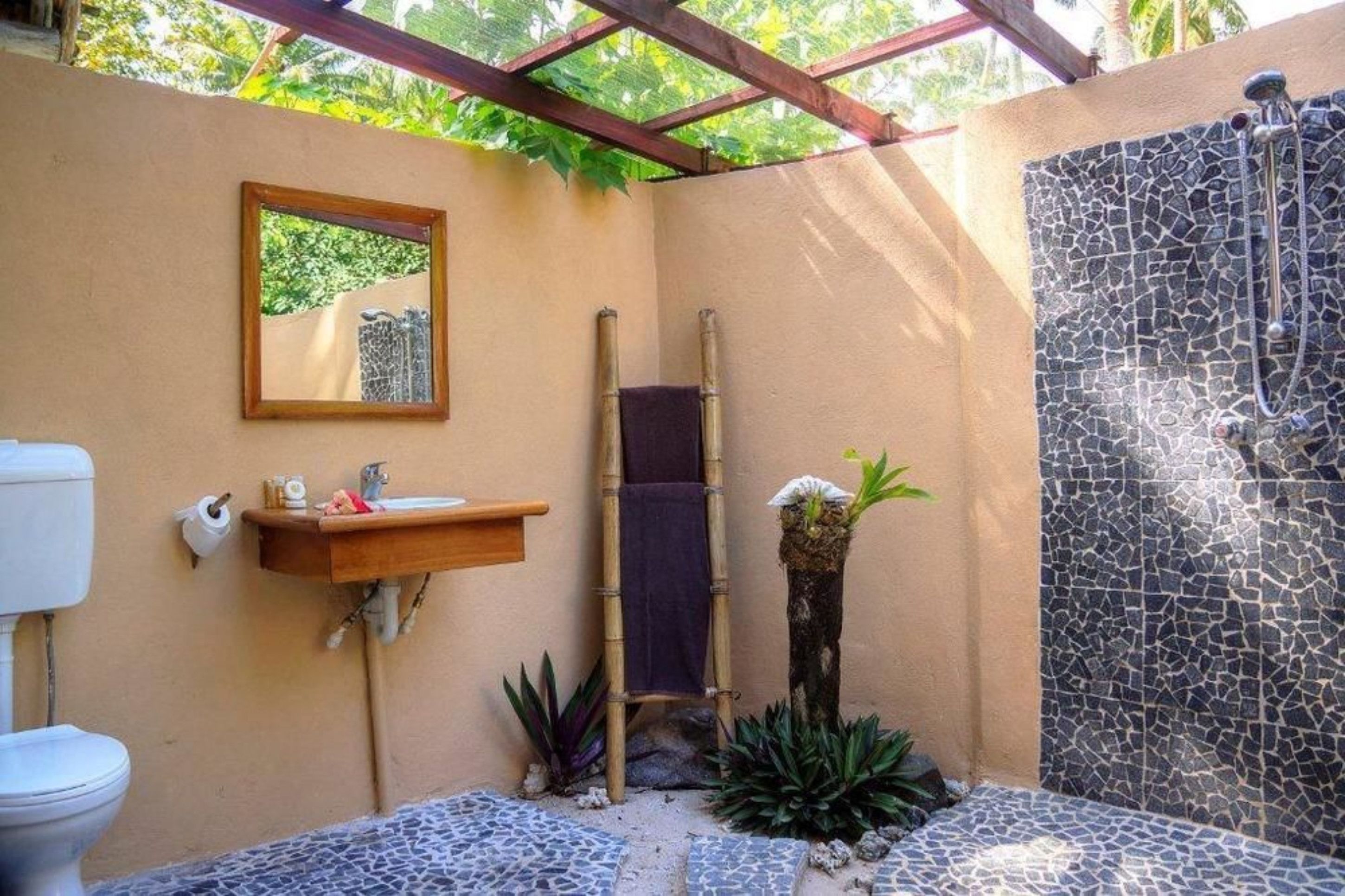 beachfront bure | bathroom | shower, free toiletries, towels