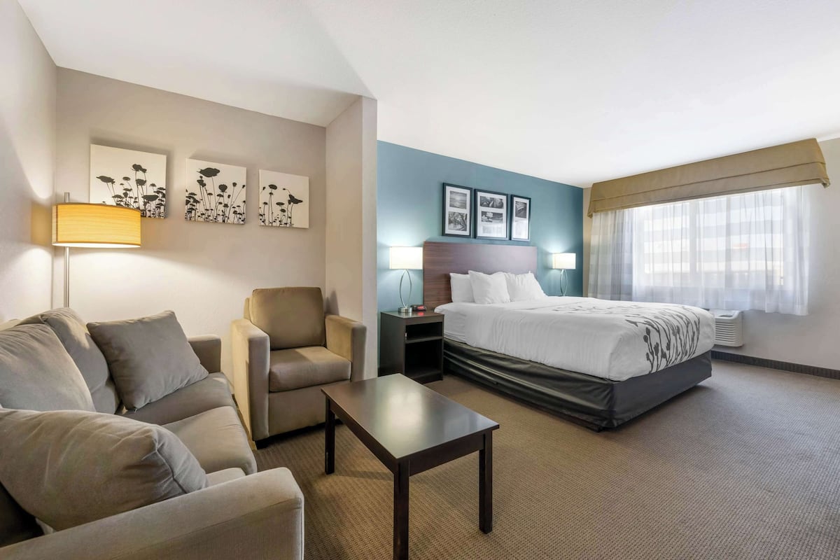 premium bedding, desk, blackout curtains, iron/ironing board