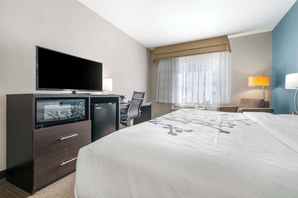 premium bedding, desk, blackout curtains, iron/ironing board