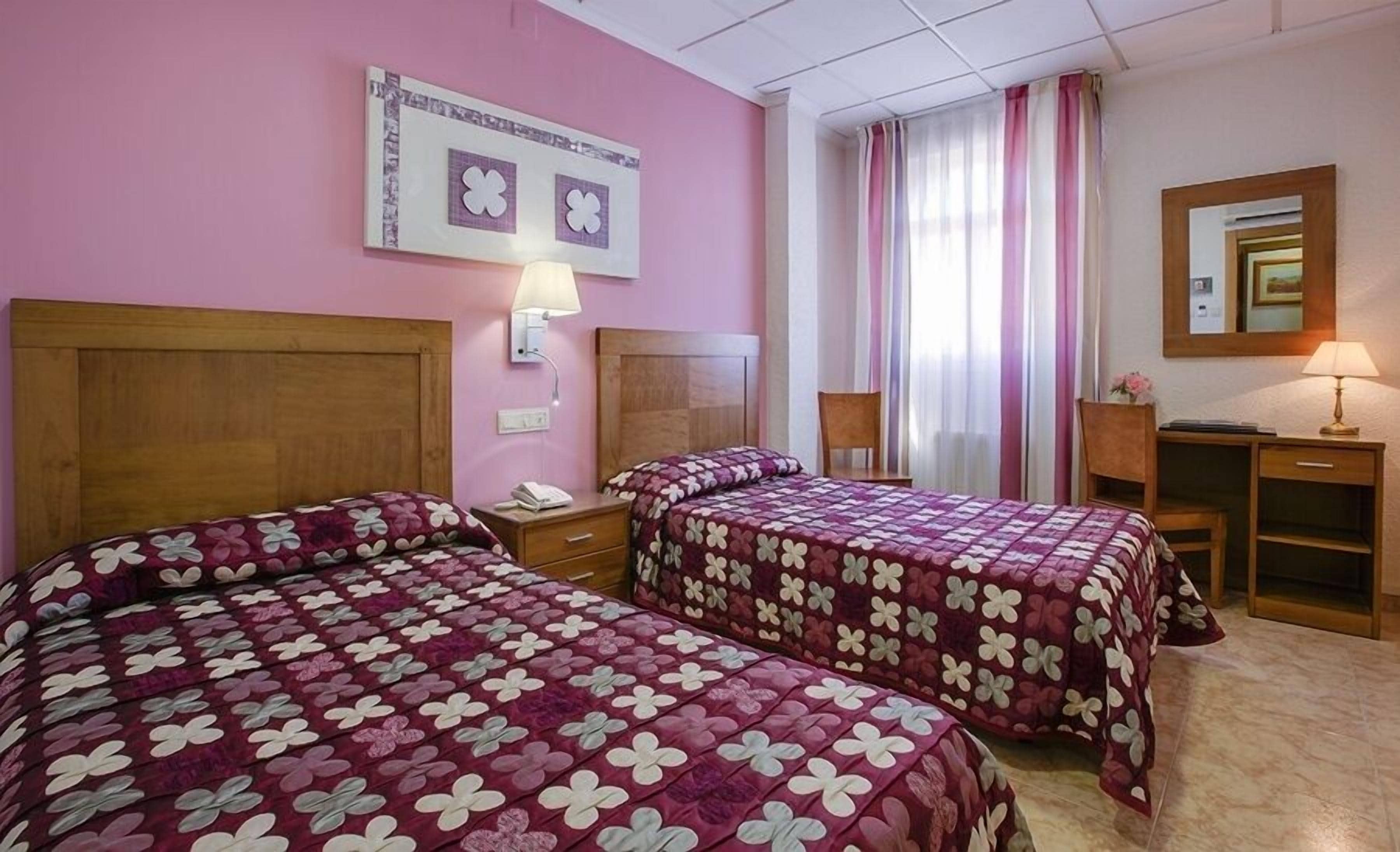 Desk, laptop workspace, free WiFi, bed sheets