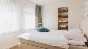 Holiday home A | Premium bedding, in-room safe, blackout drapes, iron/ironing board