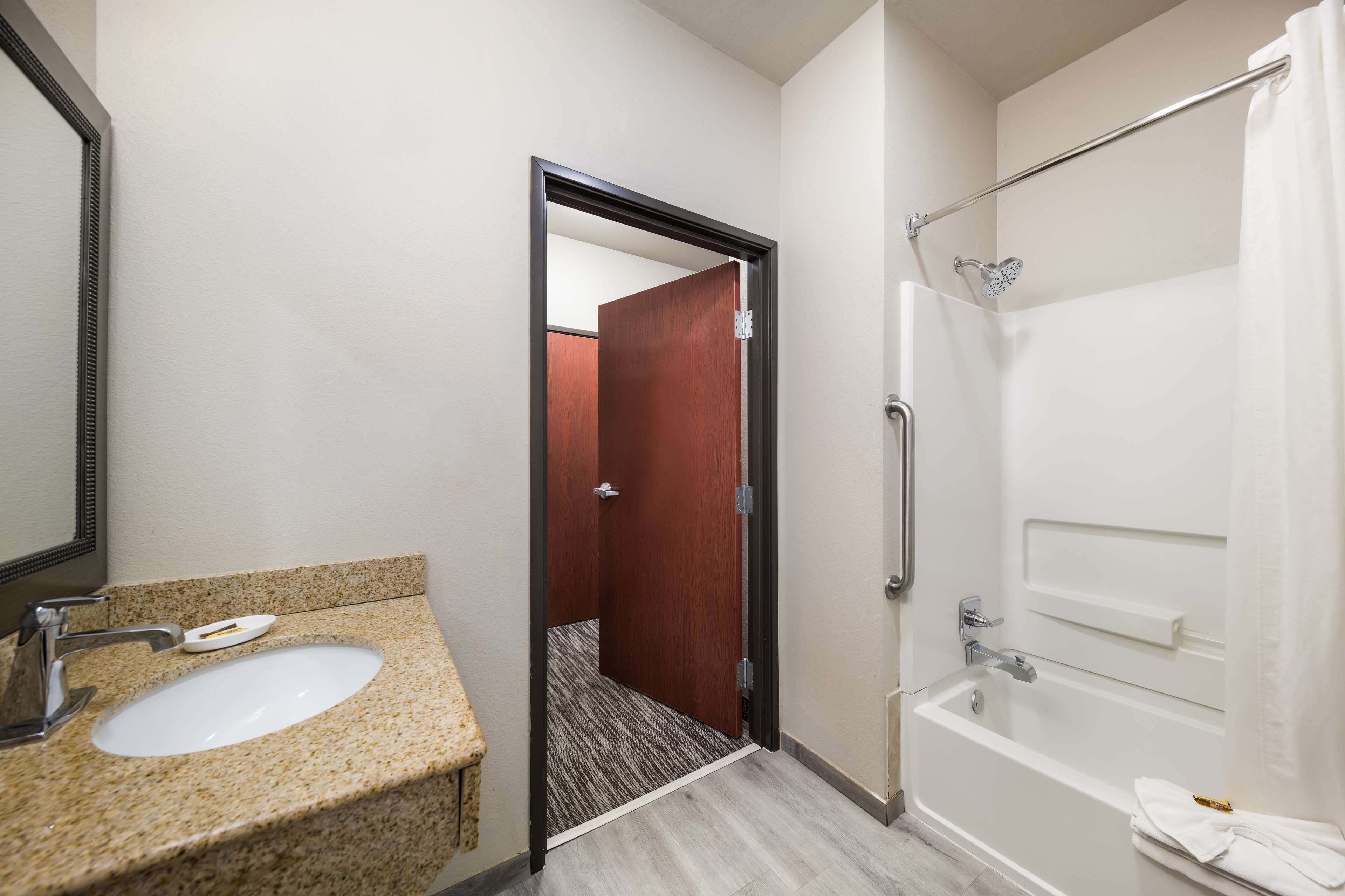 suite, 2 queen beds, accessible, refrigerator & microwave (with sofabed) | bathroom | free toiletries, hair dryer, towels