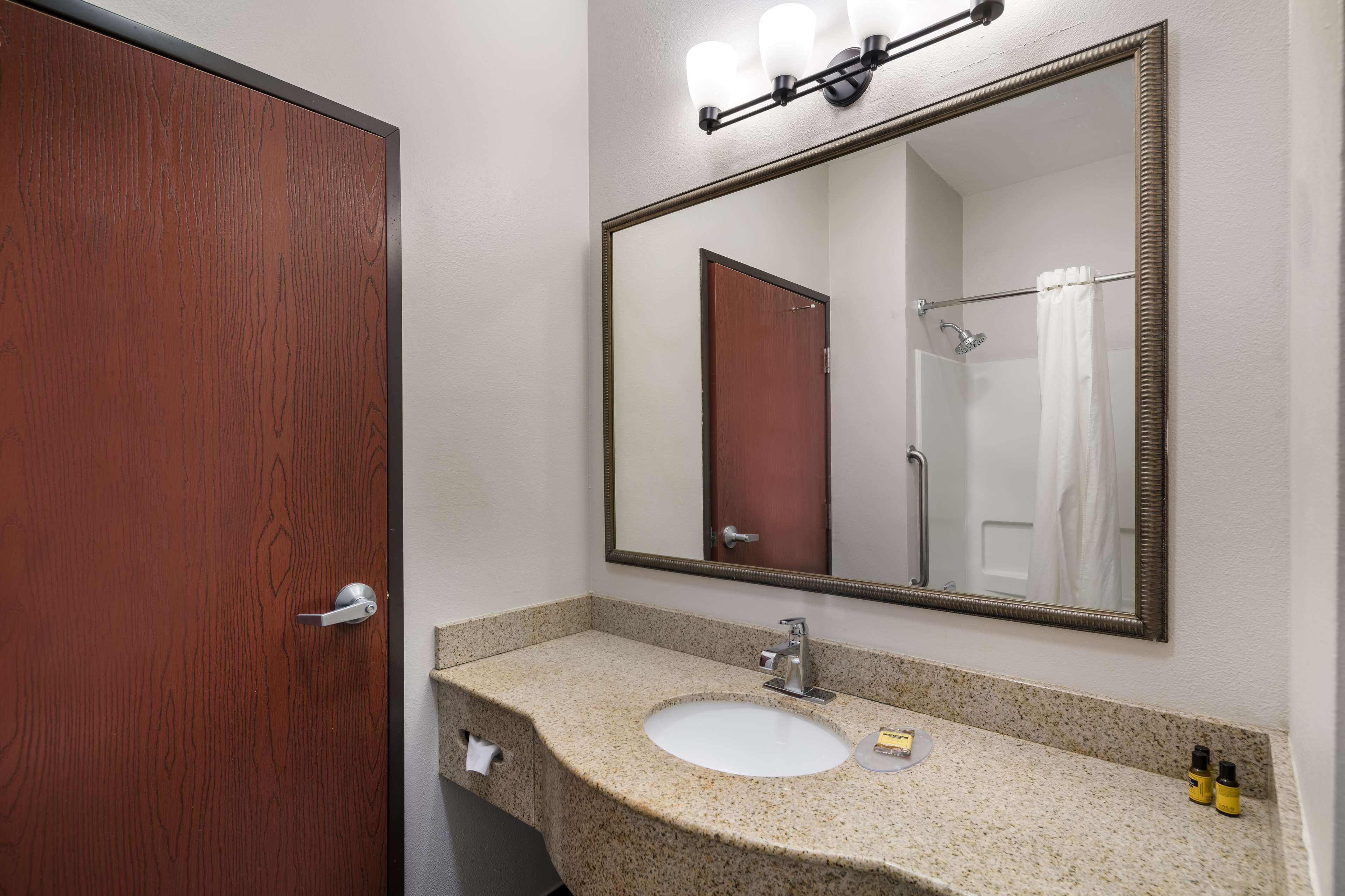 suite, 2 queen beds, non smoking, refrigerator & microwave (with sofabed) | bathroom | free toiletries, hair dryer, towels
