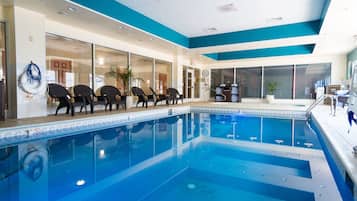 Indoor pool, outdoor pool, pool umbrellas, pool loungers